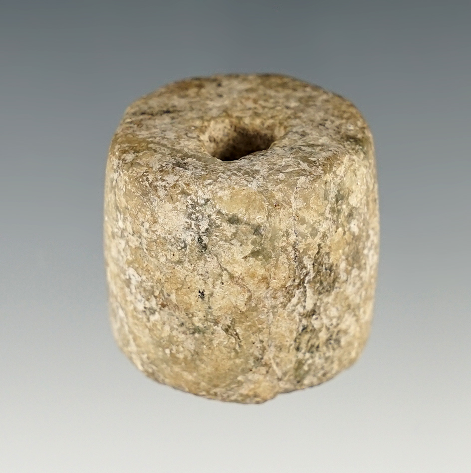 1 1/8" Hardstone Bead with the drilling started but not complete. Found in the Midwest.