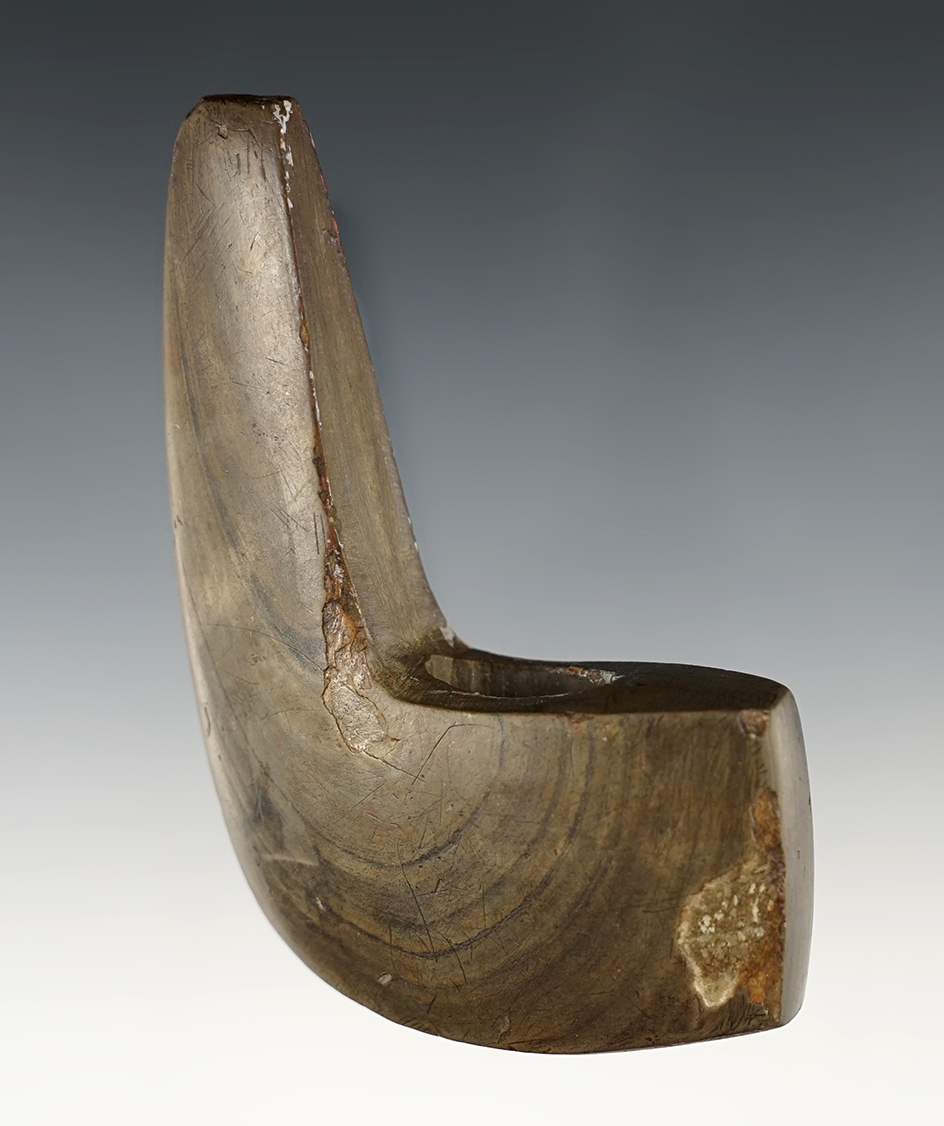 3 7/8" Archaic Geniculate with several areas of restoration. Ex. Raymond Vietzen Collection.