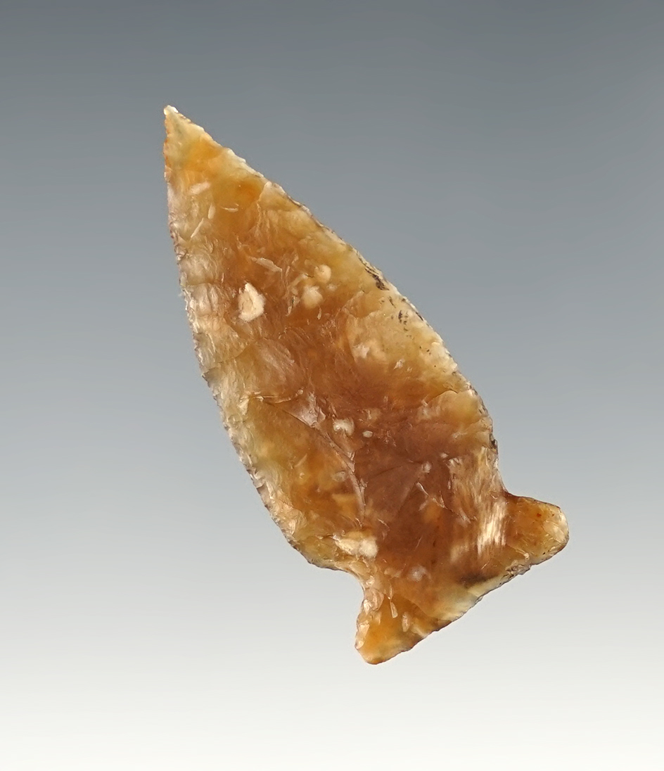 Finely made 1 5/8" Side Notch found in North Dakota. Made from Knife River Flint.