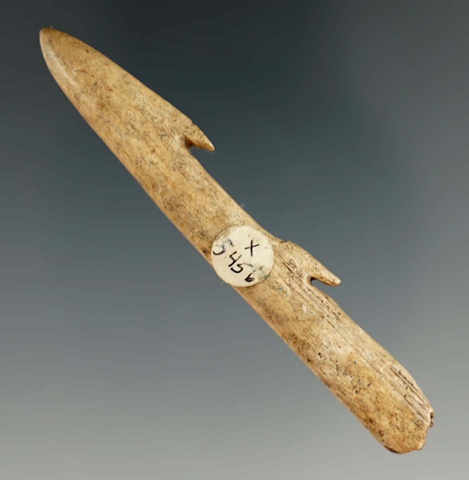 2 7/8" double Barb bone harpoon tip found in Greene Co., Illinois.