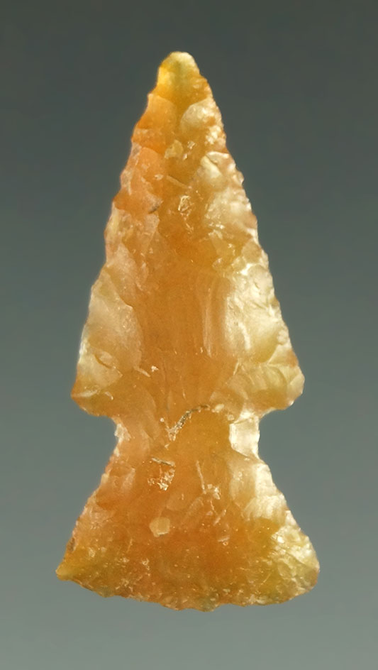 1 1/16" Bird Point made from orange chalcedony found in southeast Arizona.