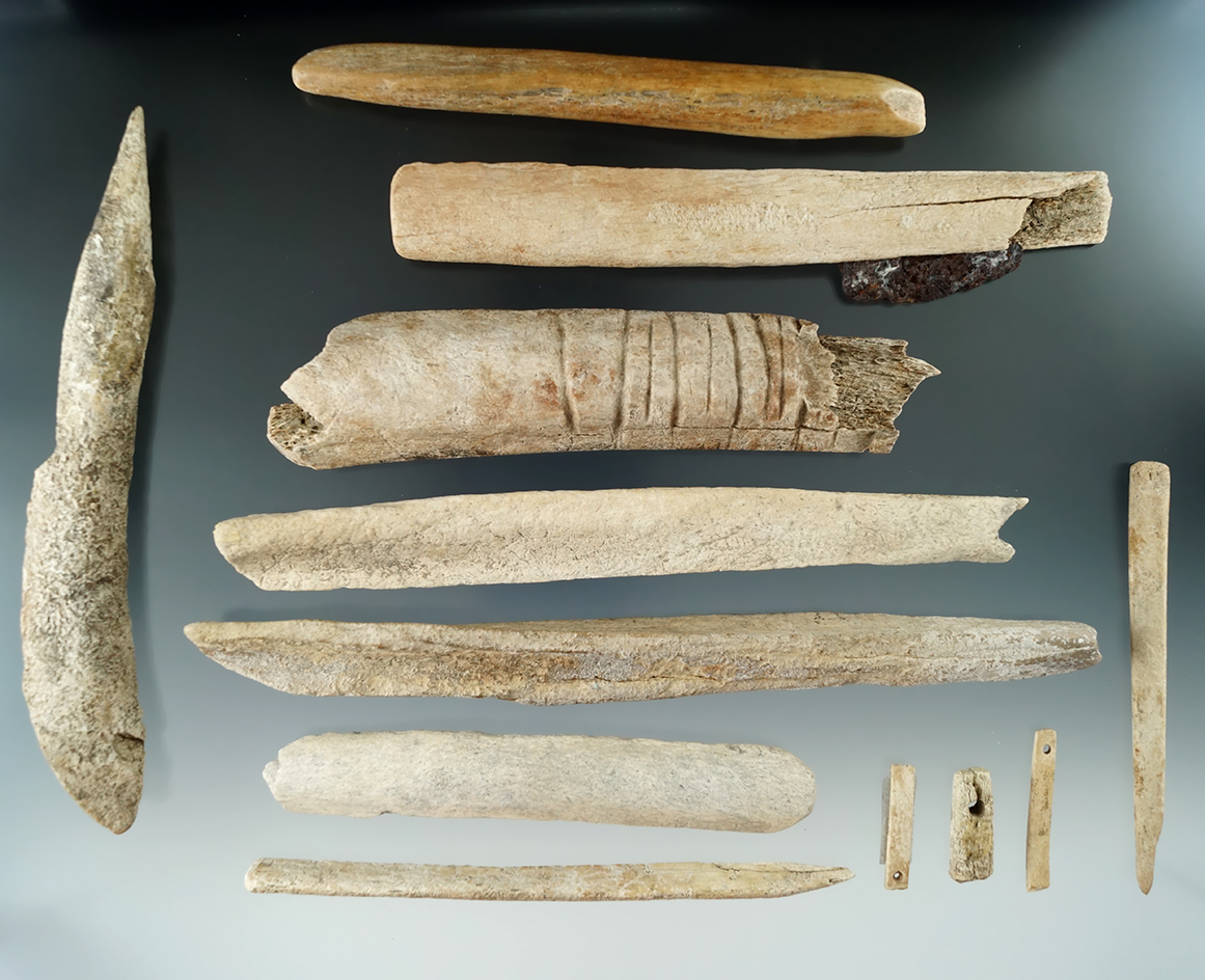 Group of assorted bone artifacts found in the Dakotas, largest is 6 1/8".