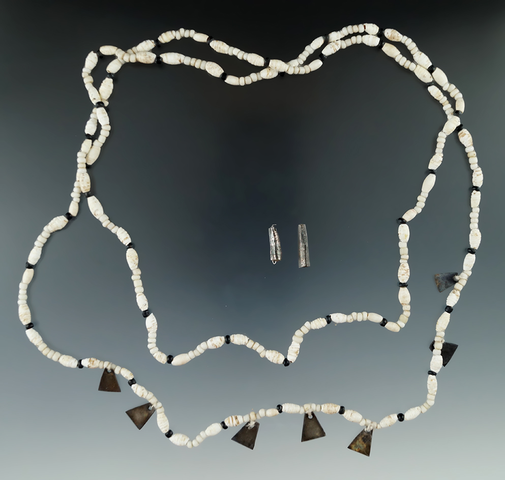 42" long strand of shell and trade beads with metal dangles found in Lee County Mississippi.