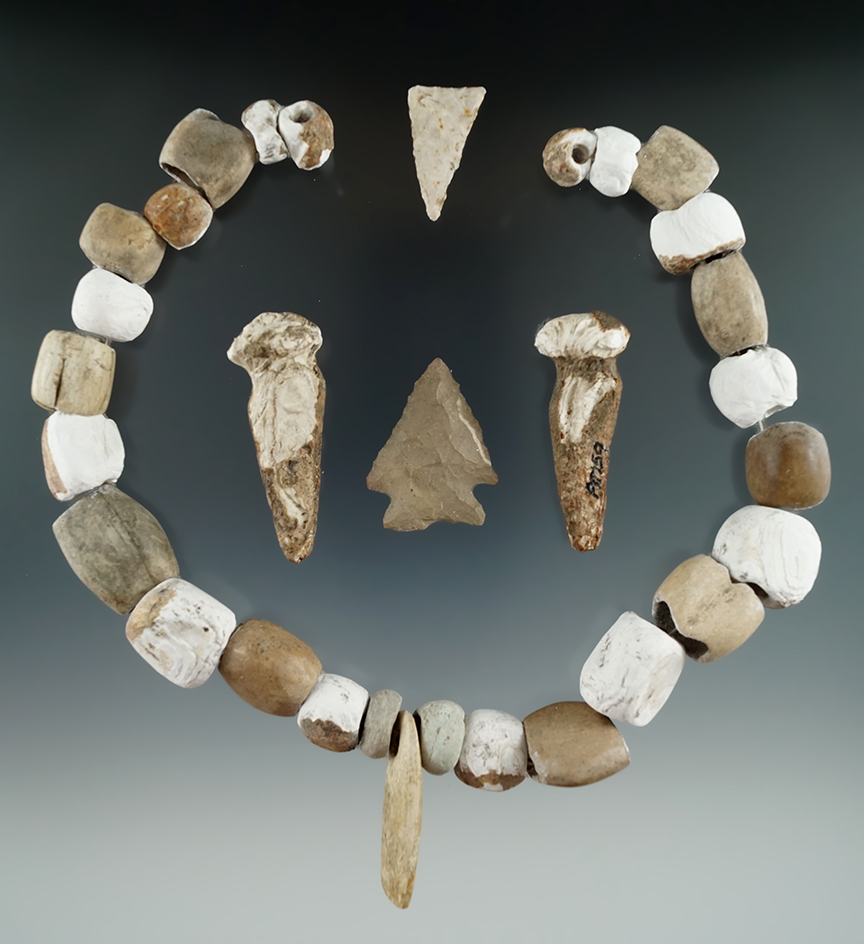 Nice set of Shell beads, 2 earplugs and 2 points found together in Cabell County, West Virginia.