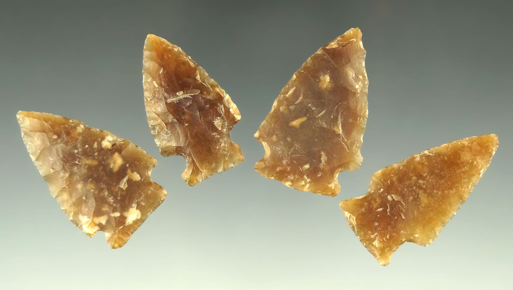 Set of four Knife River Flint arrowheads found in the Dakotas, largest is 1 5/16".