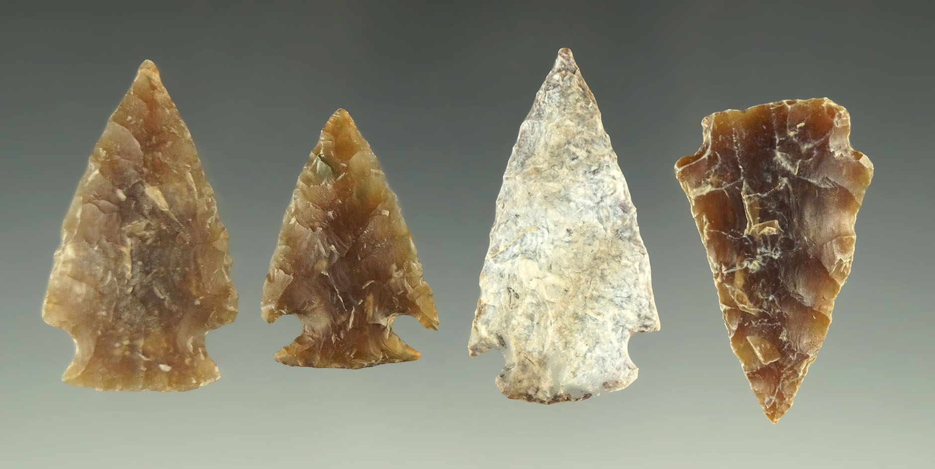 Set of four Knife River Flint arrowheads found in the Dakotas, largest is 1 1/2".