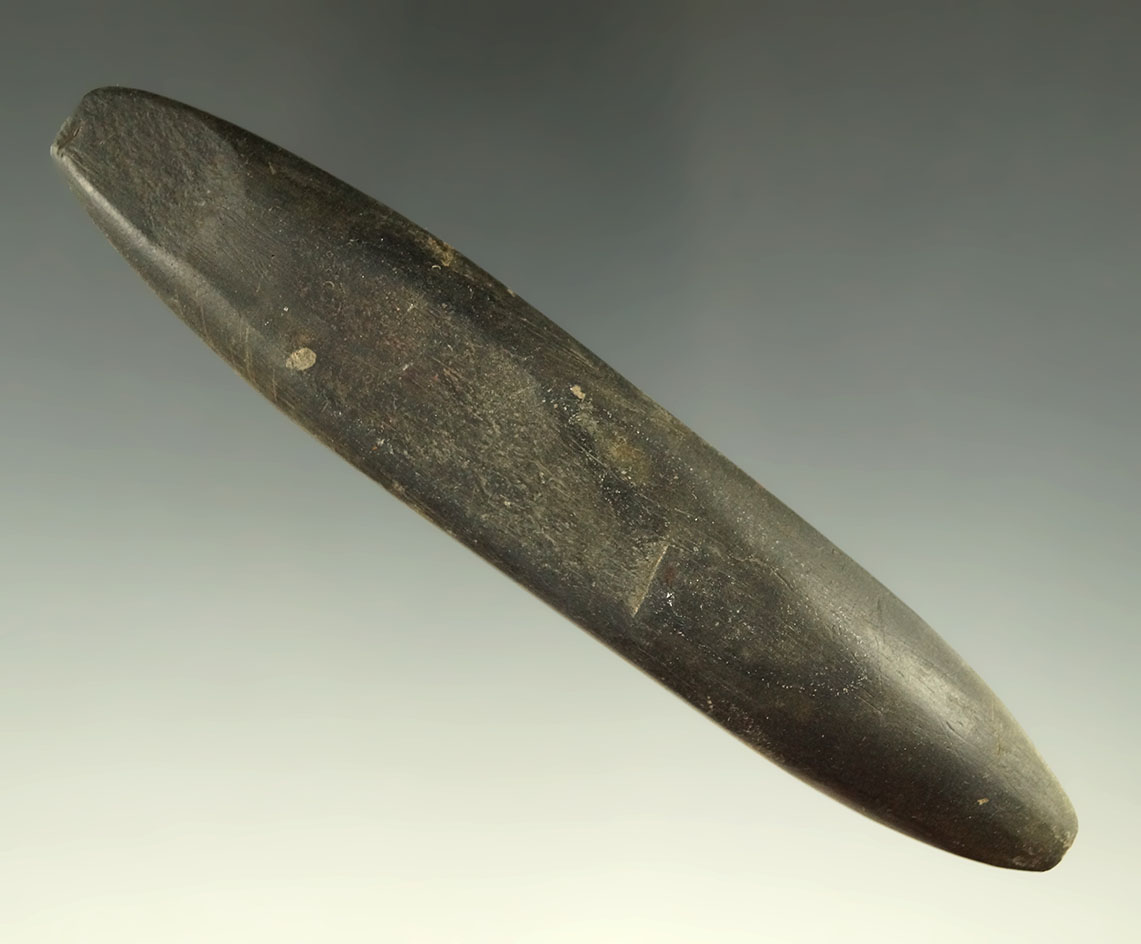 4 9/16" black slate Elliptical Bar Atlatl weight found in the Midwest.
