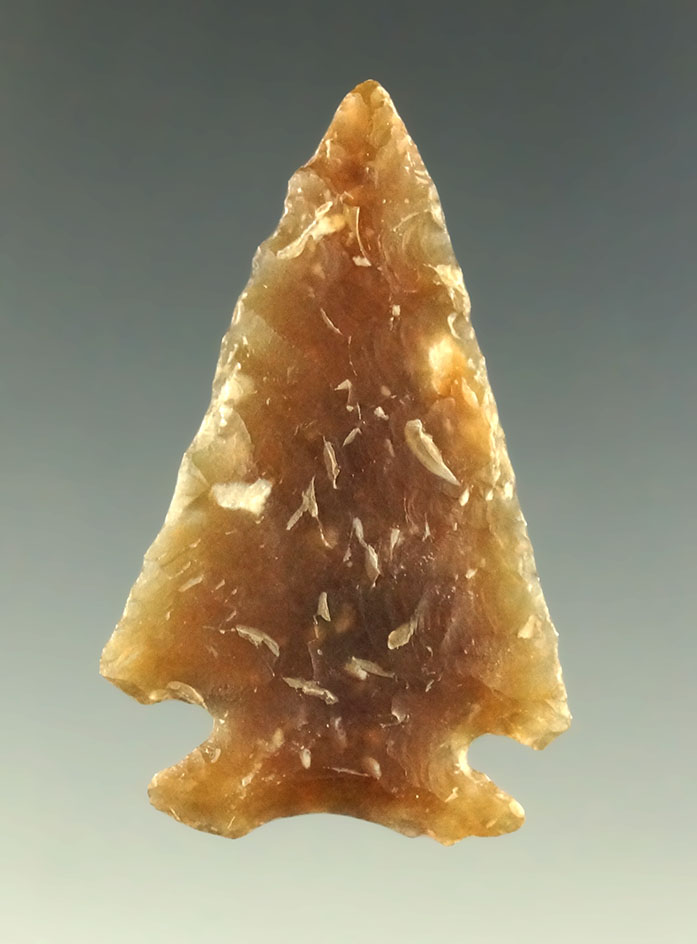 1 1/2" Knife River Flint Cornernotch point found in the Dakotas.