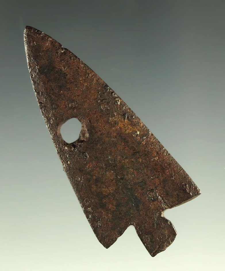 1 15/16" metal arrowhead salvaged from a barrel band found in the Plains region.