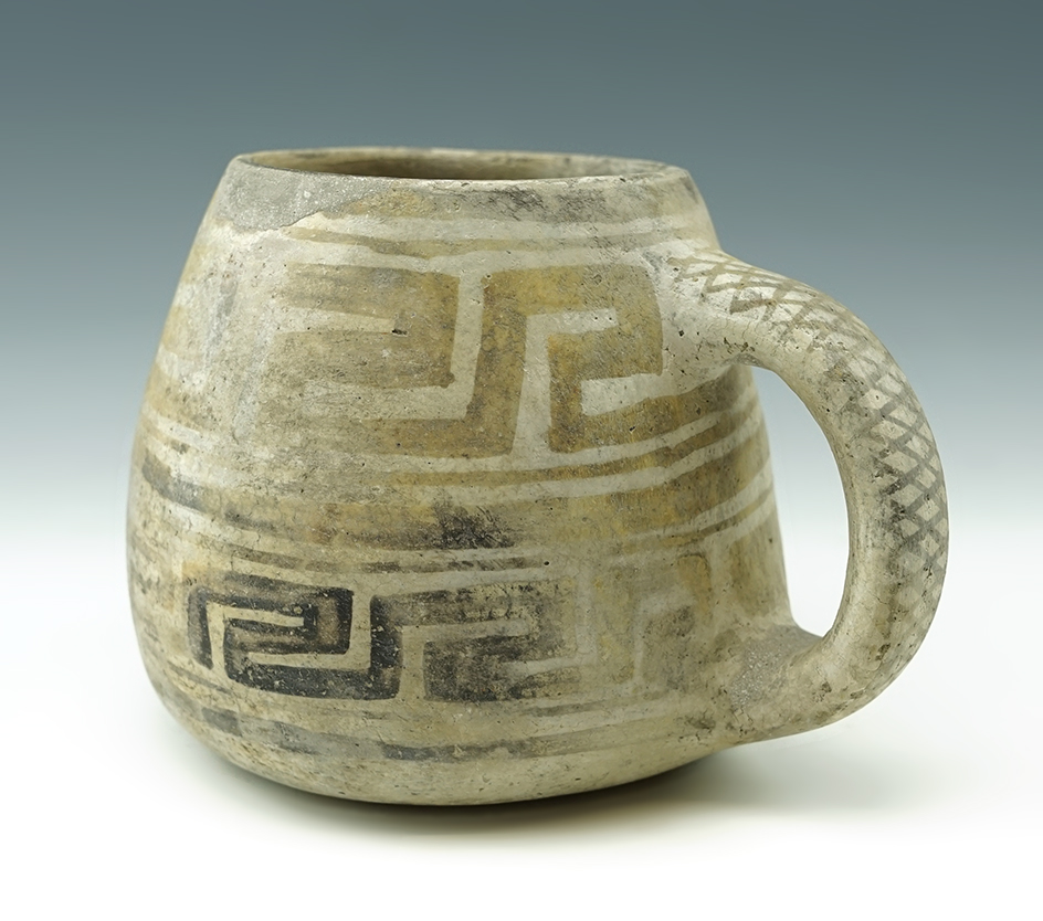 Very nice! 6" wide x 4 1/8" tall handled pottery cup with some restoration found in New Mexico.