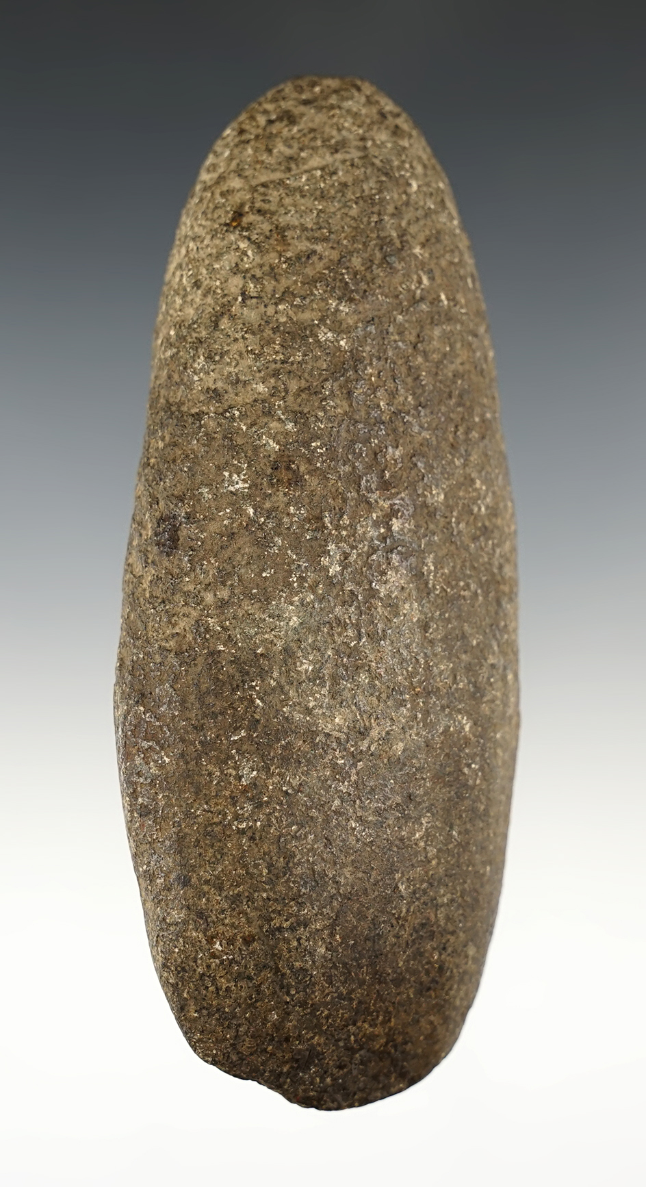 Heavily patinated 5 1/16" Hardstone Celt found in Paulding Co., Ohio.