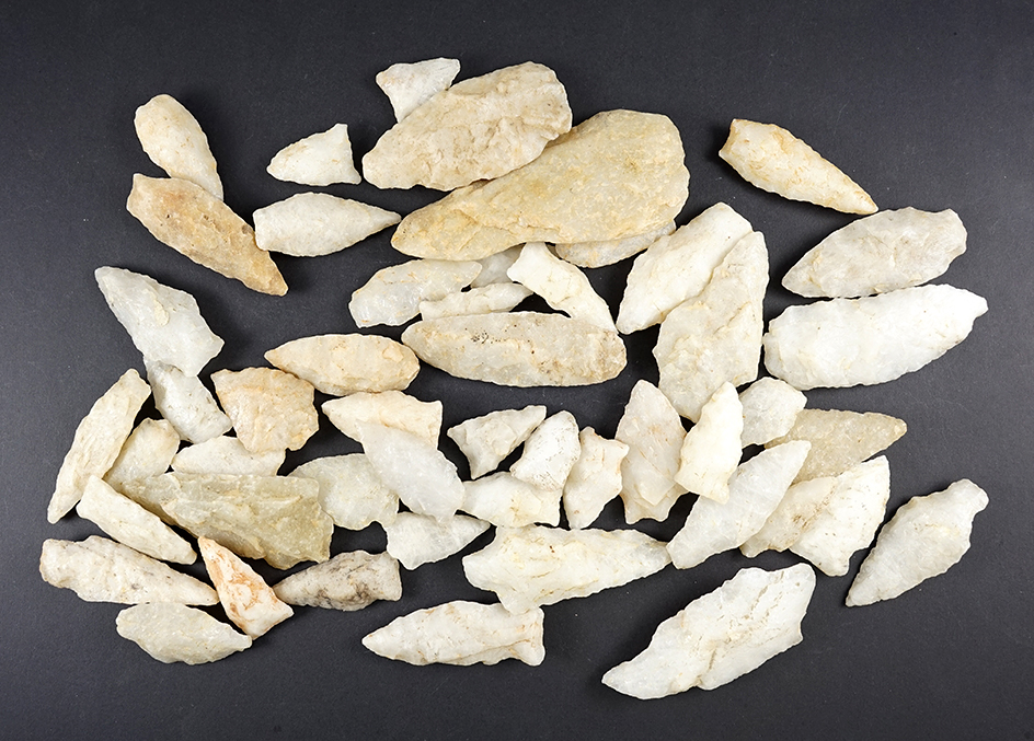 50 Quartz Arrowheads that were surface found in the Cecil Co., Maryland area. Most are in good condi