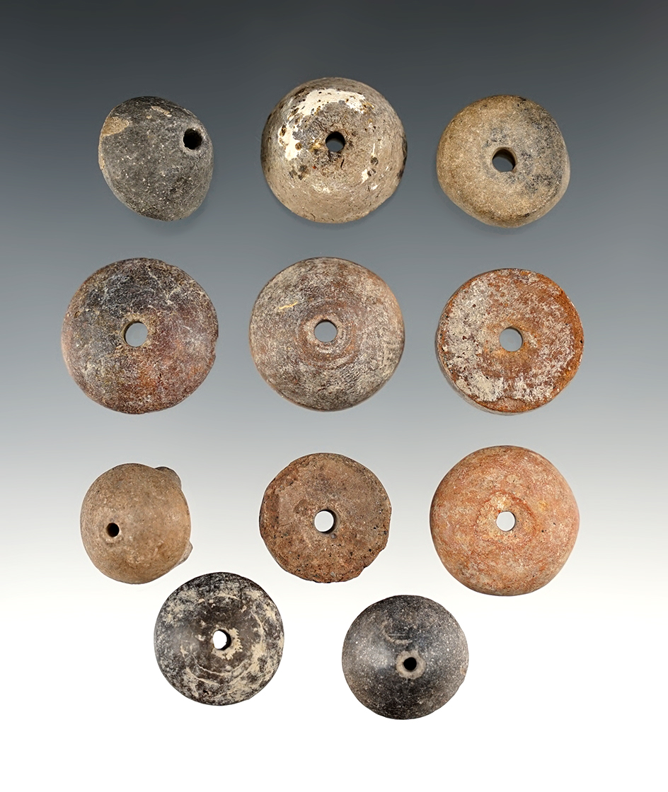 Group of 11 Pre-Columbian Clay spindle whorls found in Central Mexico. Largest is 1".