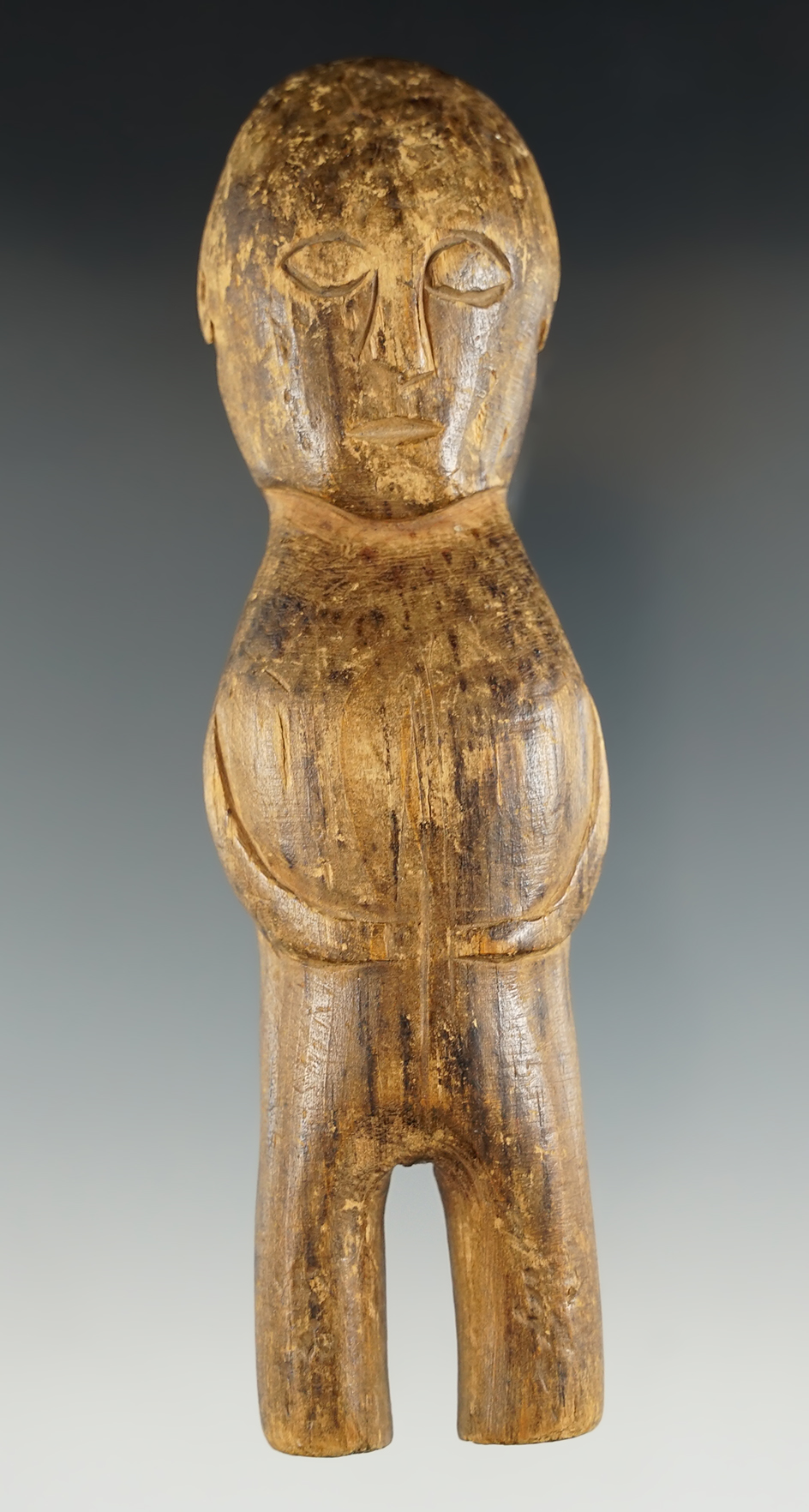 5 7/8" Tall old wood carved Inuit human figure.