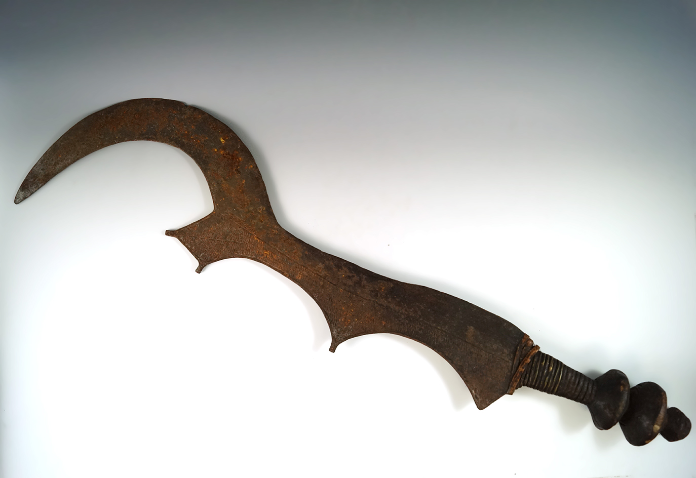 28" long Ngulu Sword. Hand carved wood handle, wire wrapped with metal blade.