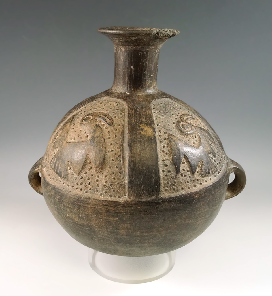 8 1/2" tall ancient Peruvian Pottery Vessel with nice bird motif in relief on the exterior.