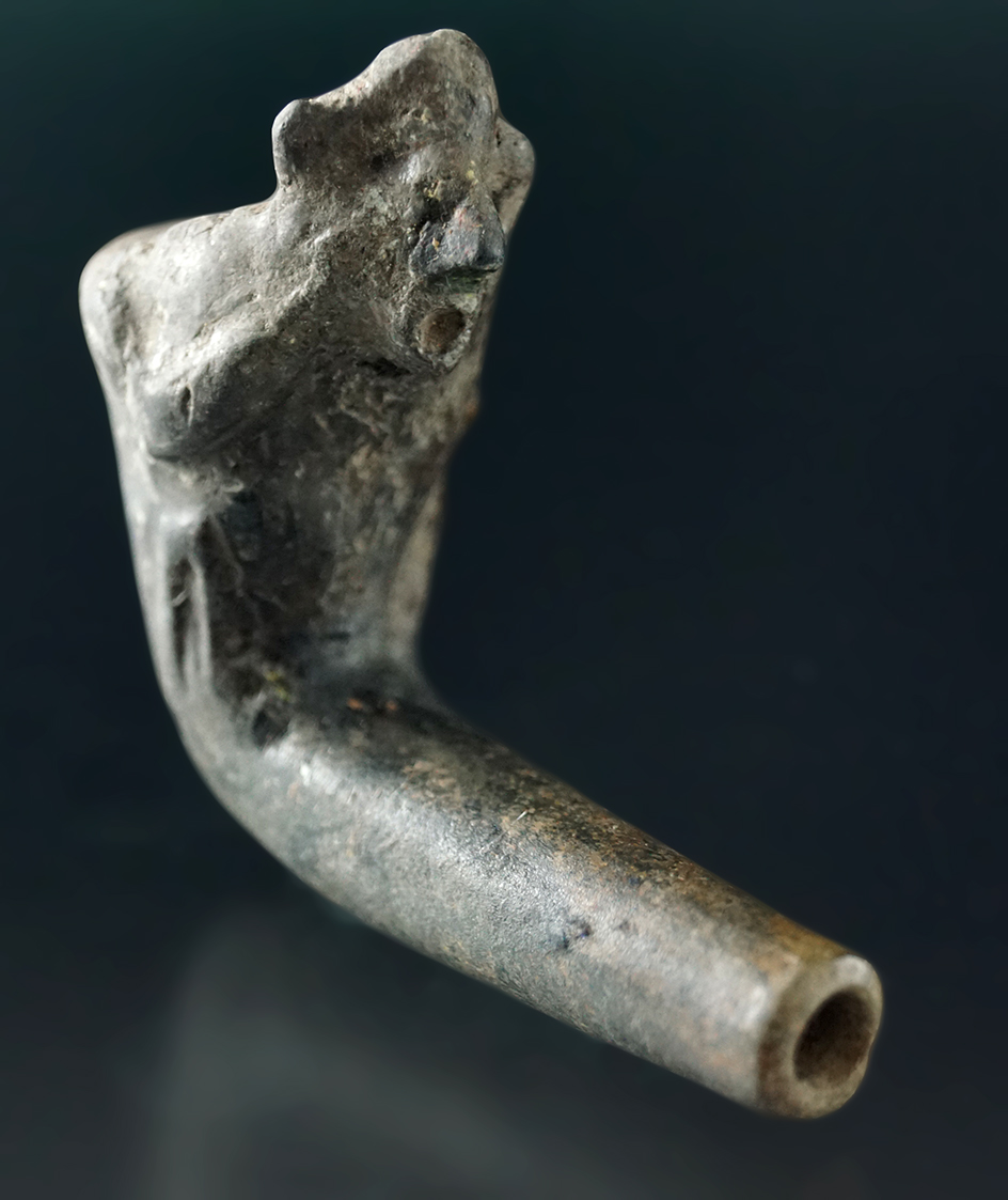 Miniature 2" long Face Pipe with minimal restoration to the bowl and mended at the elbow.