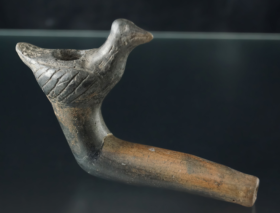 4 1/2" Bird Effigy Pipe which is broken and amended at the elbow. Nice avian effigy.