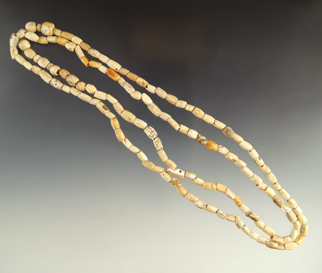 34" long strand of drilled shell beads from the collection of Lewis Eulert.