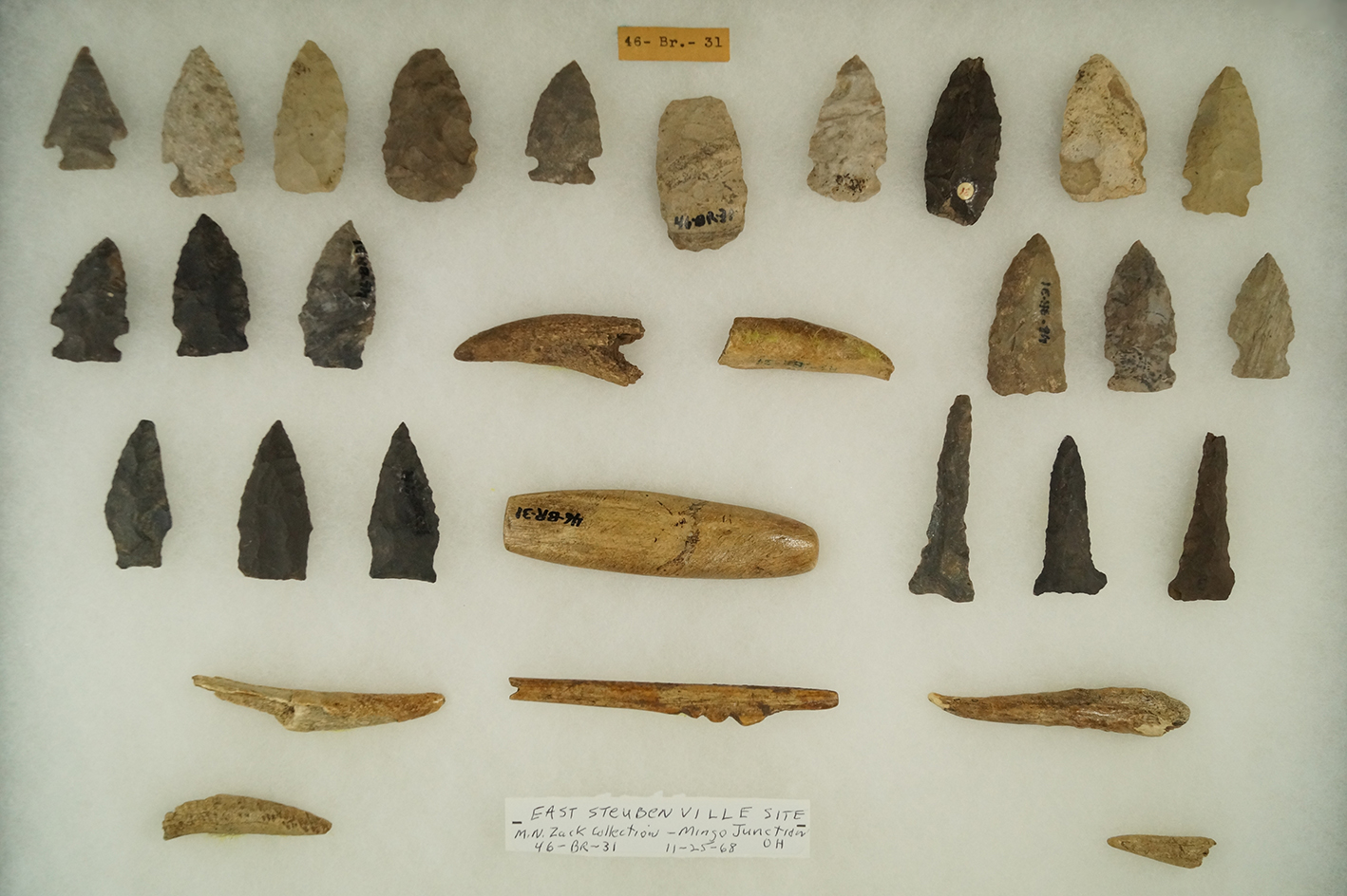 Group of Flint bone and antler artifacts from the East Steubenville site. Largest is 3 1/2". Ex. Bel