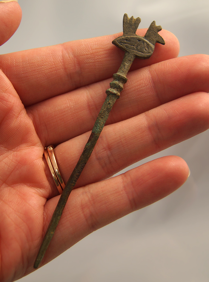 Highly ornate 3 5/8" bronze pin from ancient Luristan with an avian effigy.
