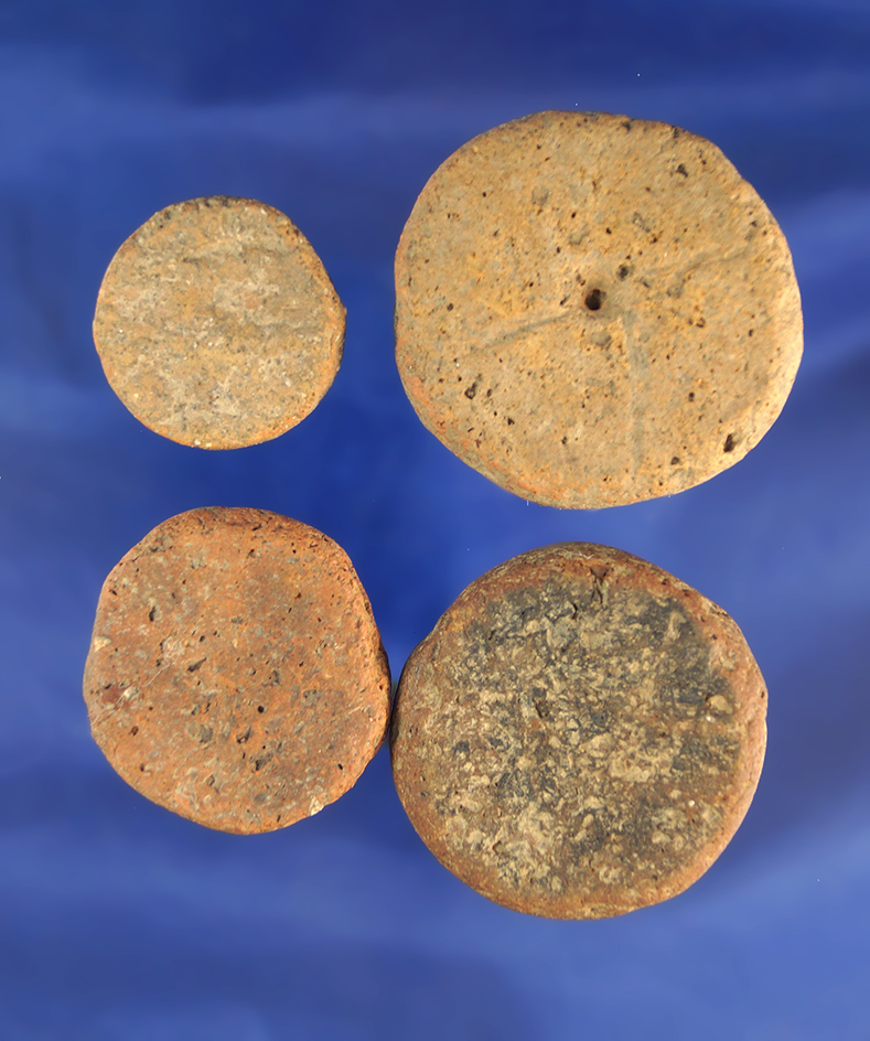 Set of four pottery discs found in Alabama, largest is 1 9/16" diameter.