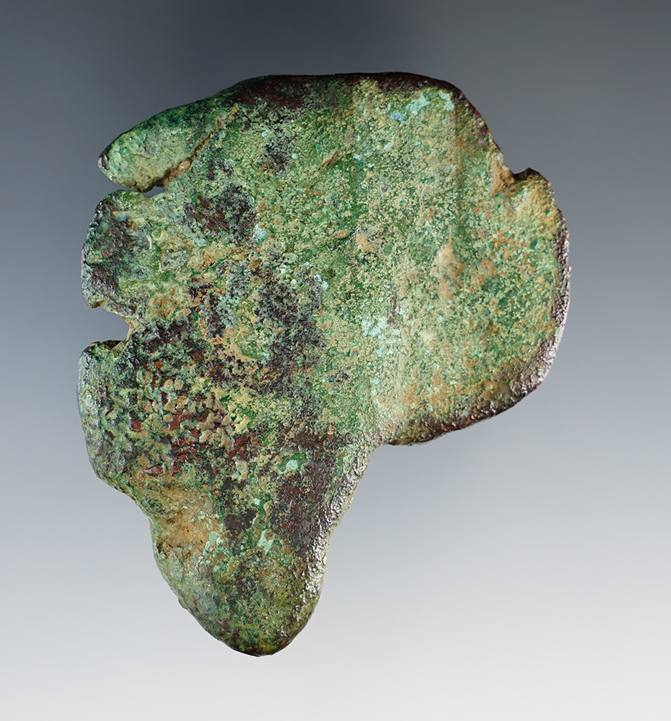 2 13/16" Copper tool with a shaped bit edge. Found on the Hopewell Farm, Ross Co., Ohio