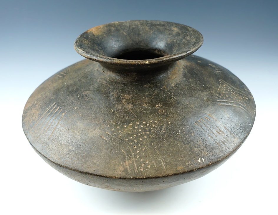 Excellent style and designs on this 10" Wide x 6" Tall black and brown Pottery Vessel.