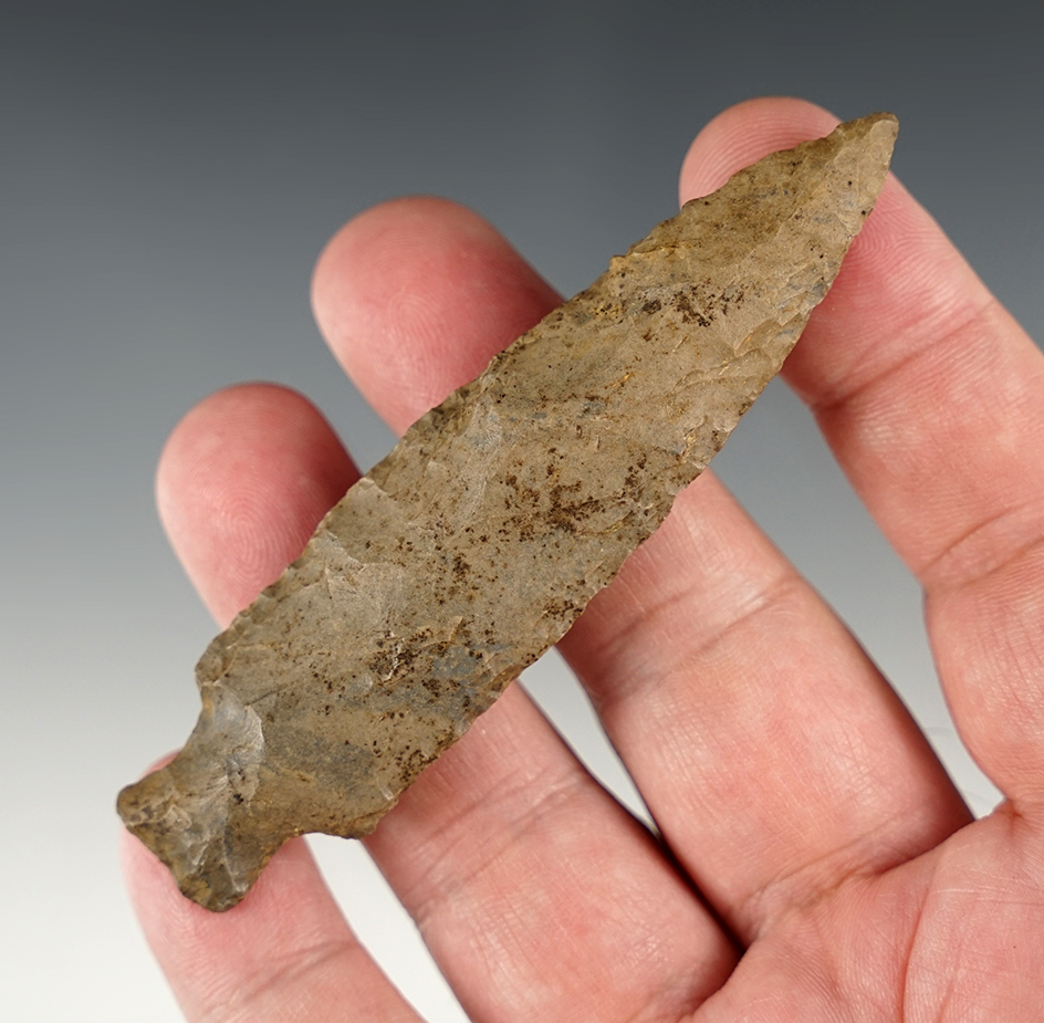 3 1/2" Fishspear found in Clarksville, Tennessee. Made from heavily patinated Dover chert.