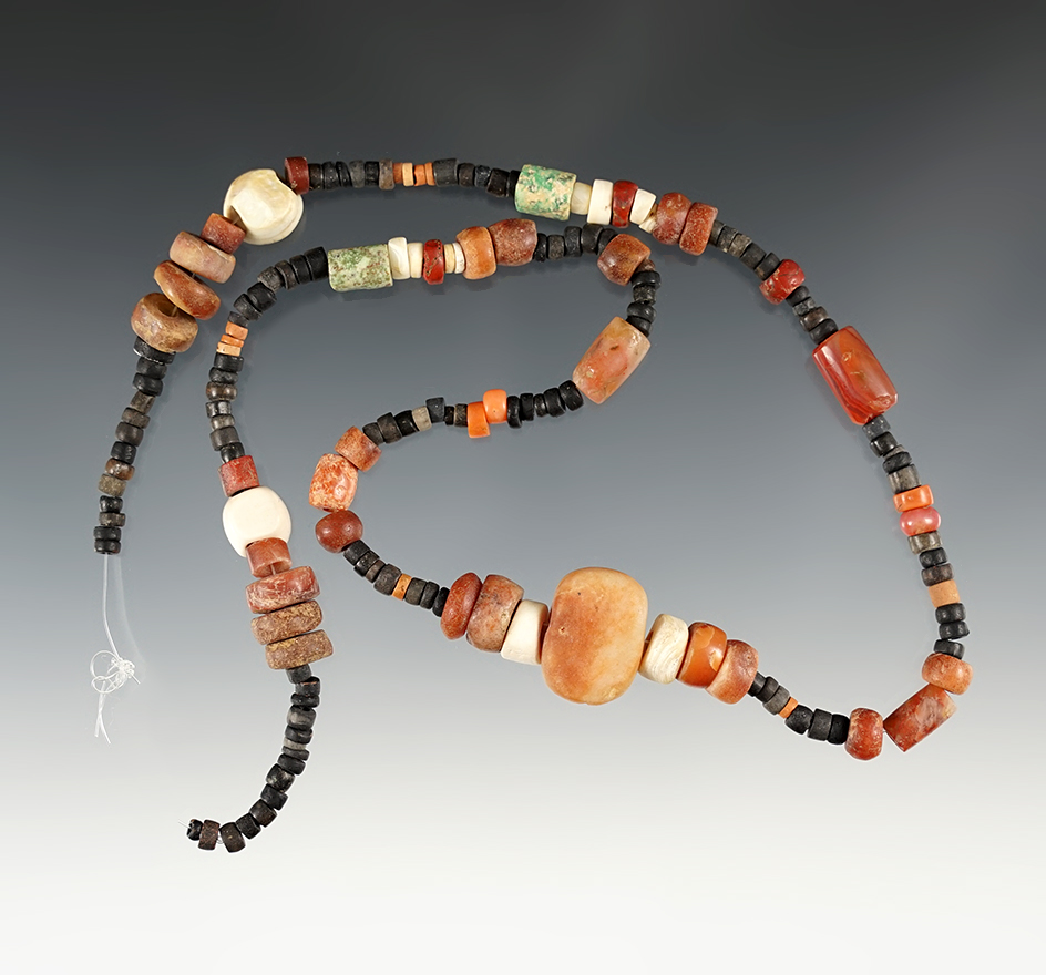 20" Strand of Tairona Beads and Pendant found in Sierra Nevada de Santa Marta, Columbia.