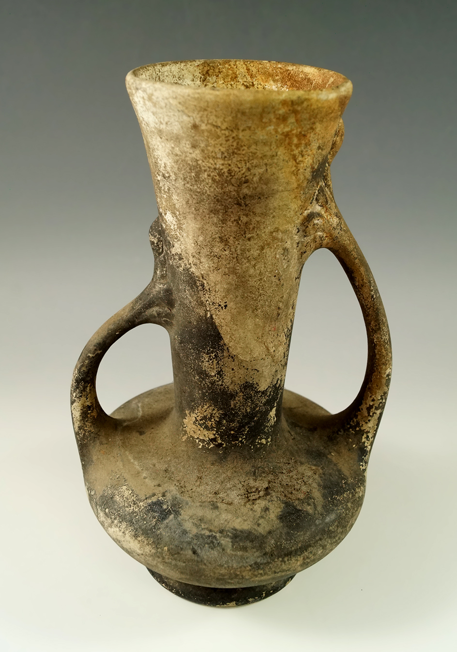 7 5/8" tall "old world" terra-cotta wine pitcher with a pedestal base in excellent condition.