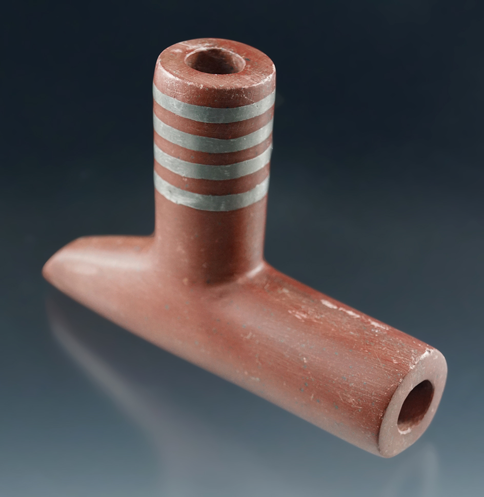 3 7/8" x 2 3/4" tall Catlinite Elbow Pipe. Nice old patinated surface with great inlays.