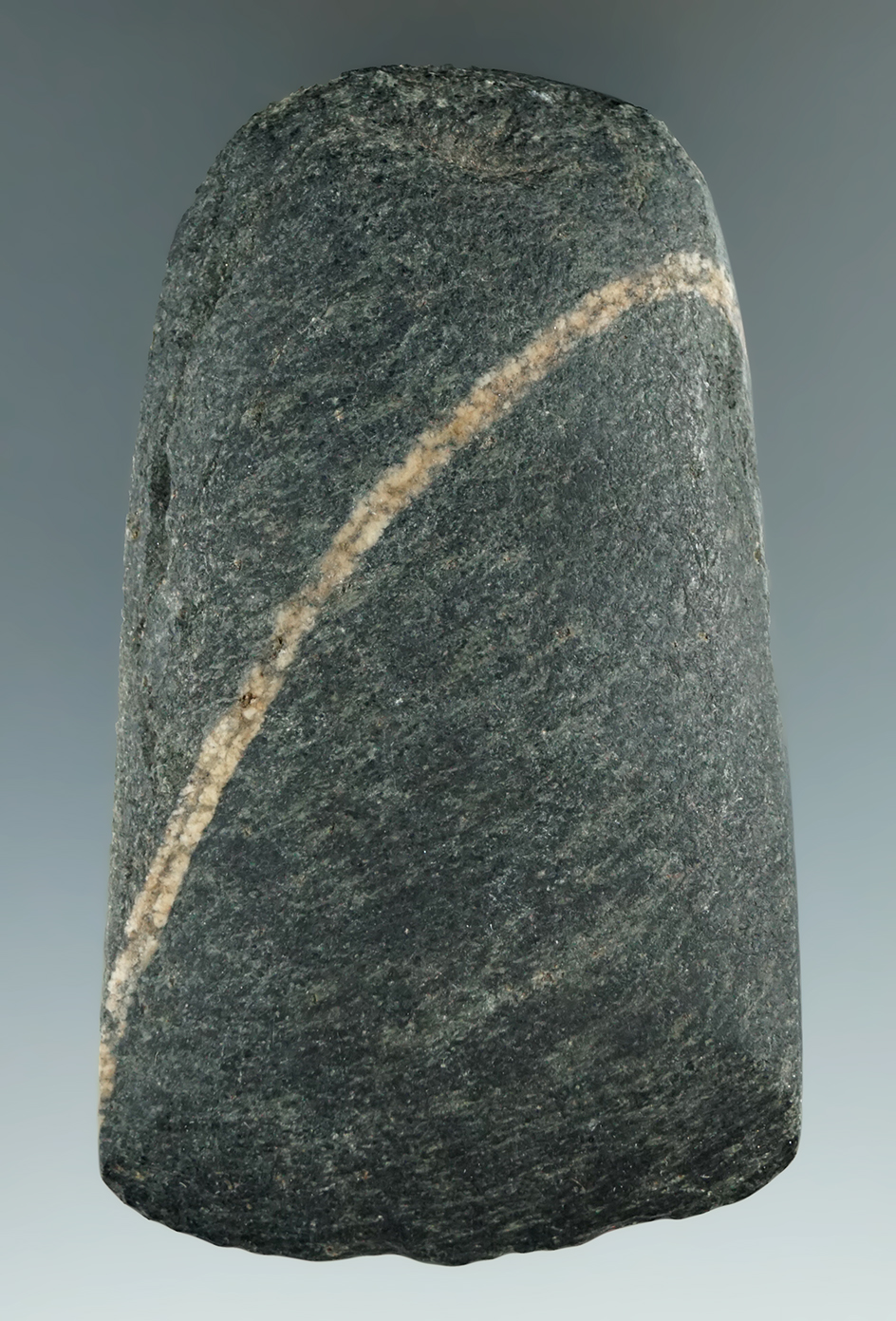 3 11/16" Hardstone Celt found in Michigan.