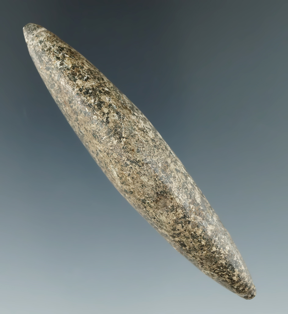 3 3/8" desert style Atl-atl weight made from hardstone with grooves at the both ends. Oregon.