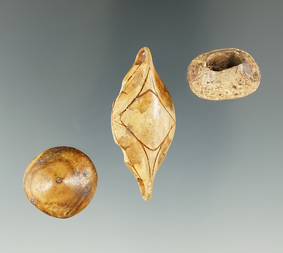 Set of three very nicely made and ornate Inuit clothing buttons made from Ivory, Alaska.
