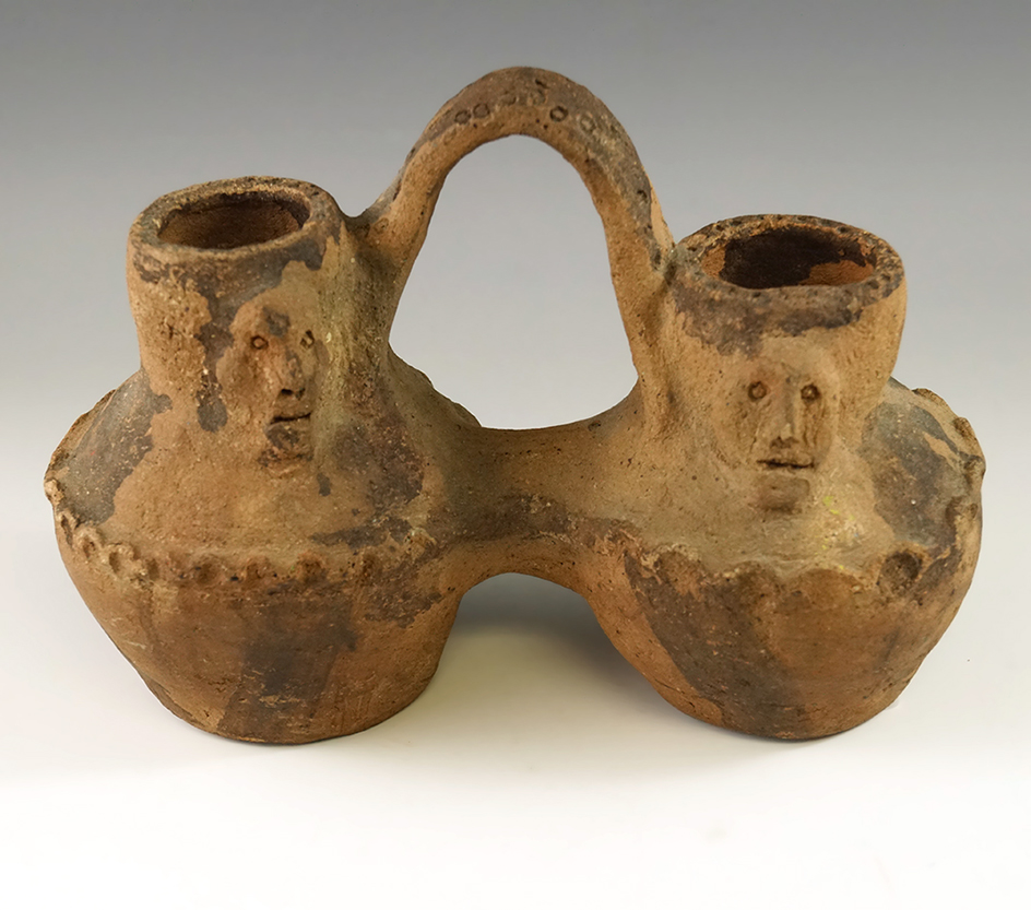 8 1/2" strap handle pre-Columbian wedding vase circa AD 400-1000 from Columbia/Ecuador area.