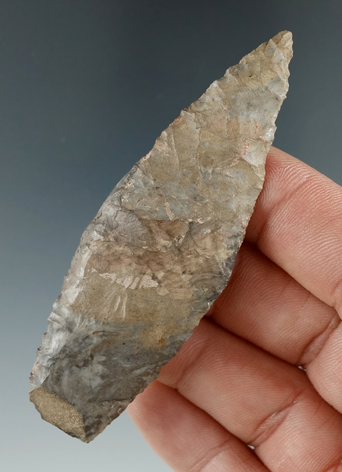3 1/16" Lanceolate made from Onondaga Flint found in New York. Restoration to midsection.
