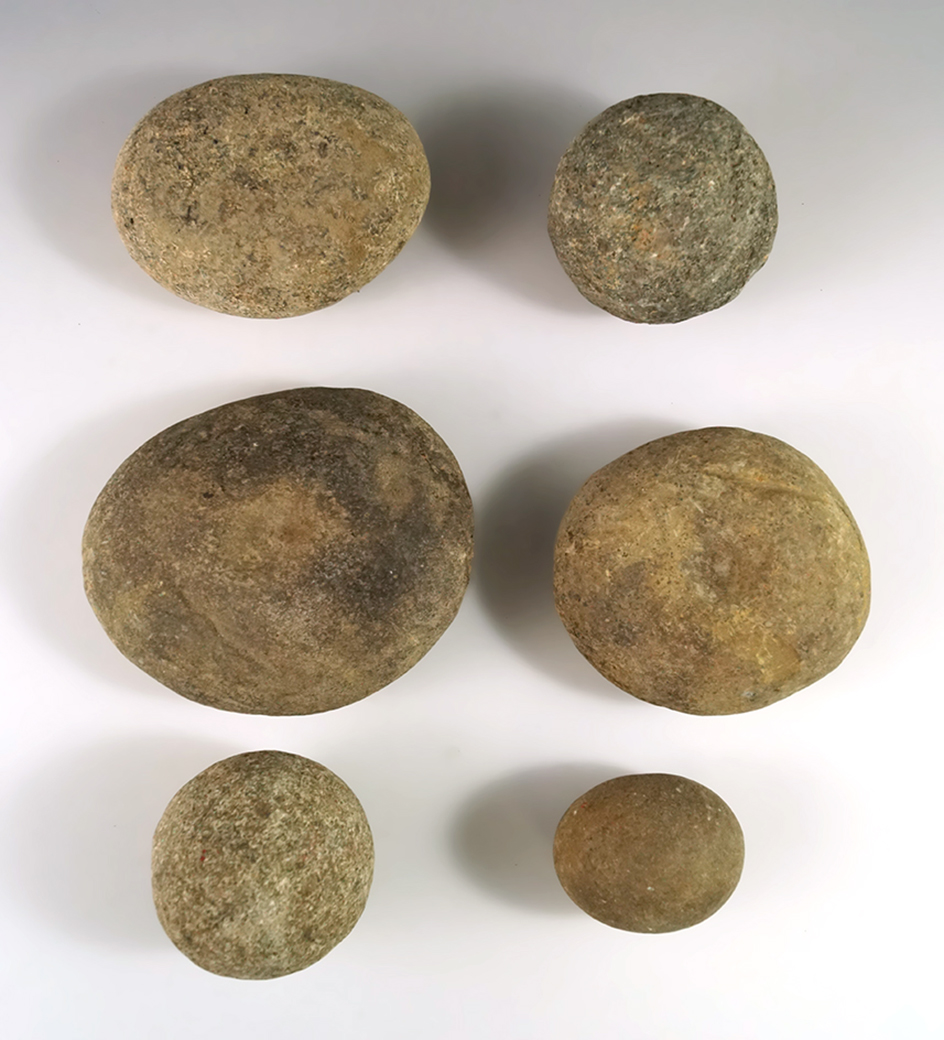 Group of six assorted Ohio tools including nutting stones and hammerstones.