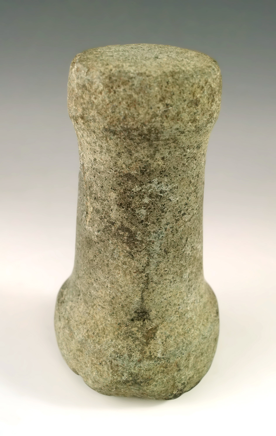 Well polished and nicely styled 5 3/16" tall Bell Pestle in nice condition found in Ohio.