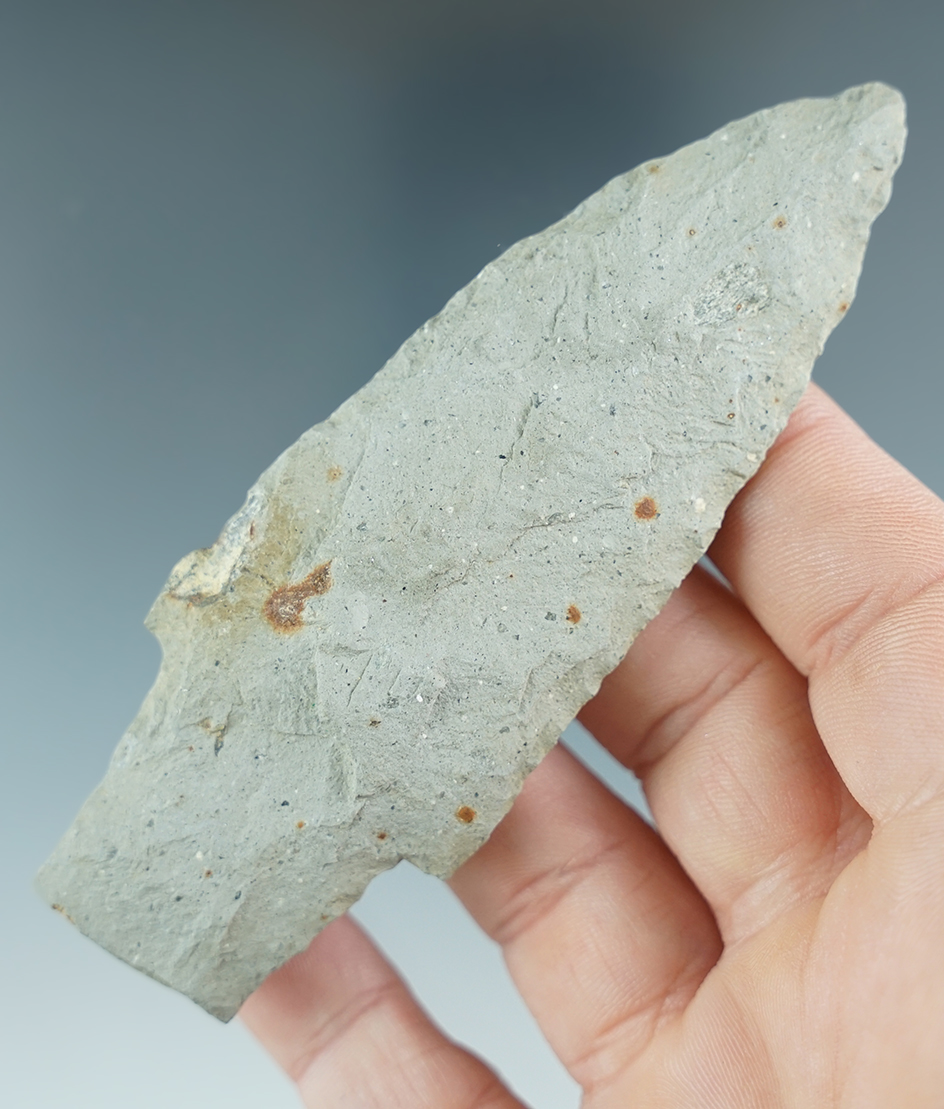 3 15/16" early Archaic stemmed knife with heavily ground stem edges found in Michigan.