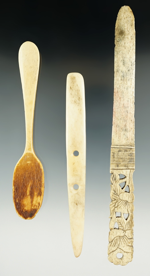 Set of four historic era carved bone items, largest is 7 1/4".