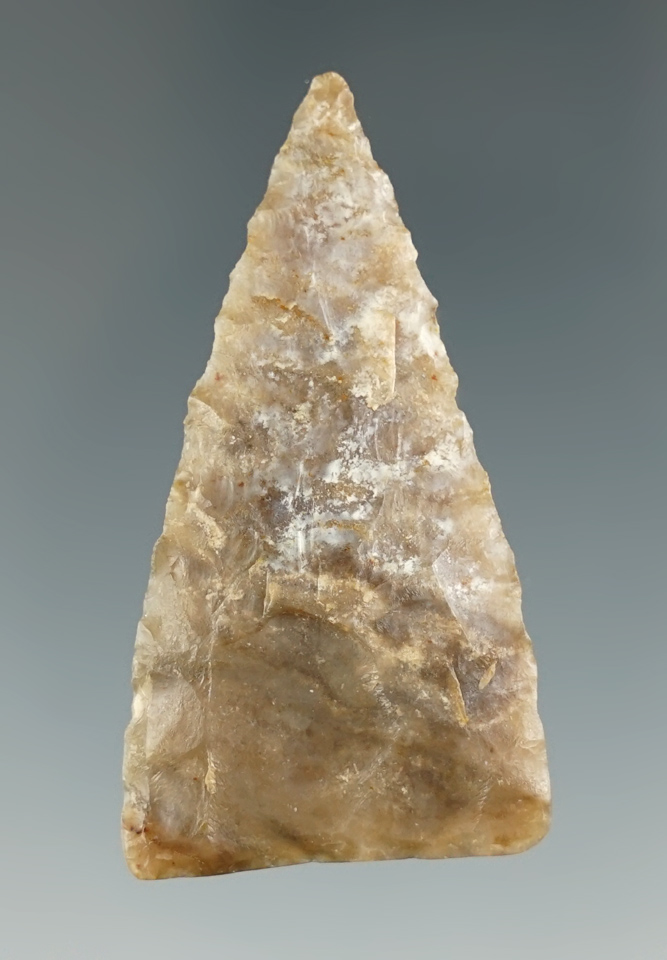 1 7/8" triangular projectile point found in North Dakota.