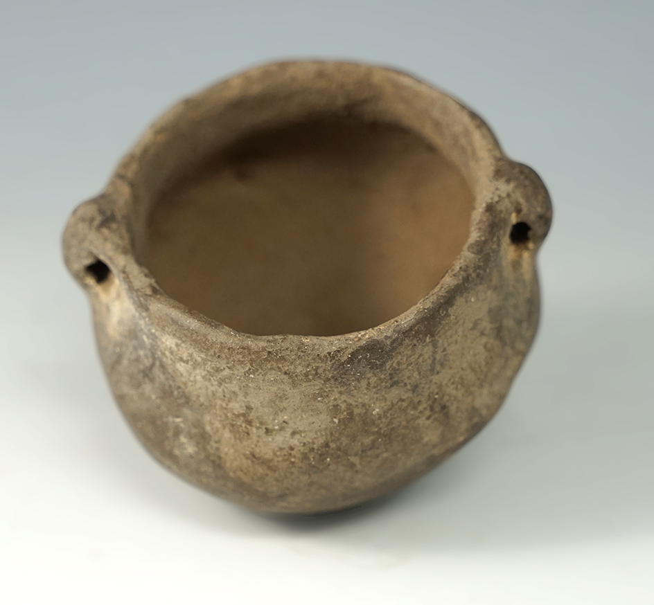 2 7/8" wide by 2 1/8" tall miniature pottery vessel found in Clay County Arkansas.