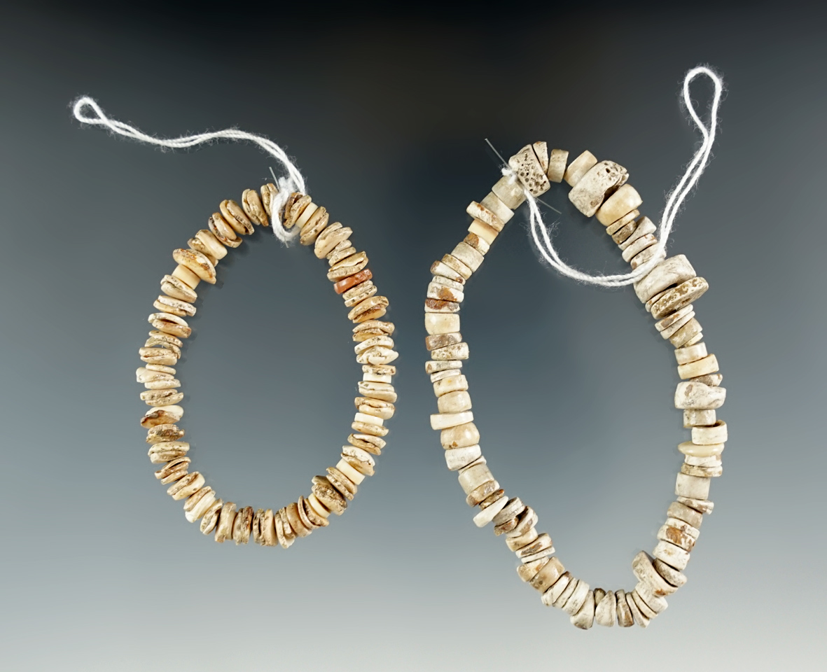 Two strands of drilled shell beads. Largest is 6 1/2".