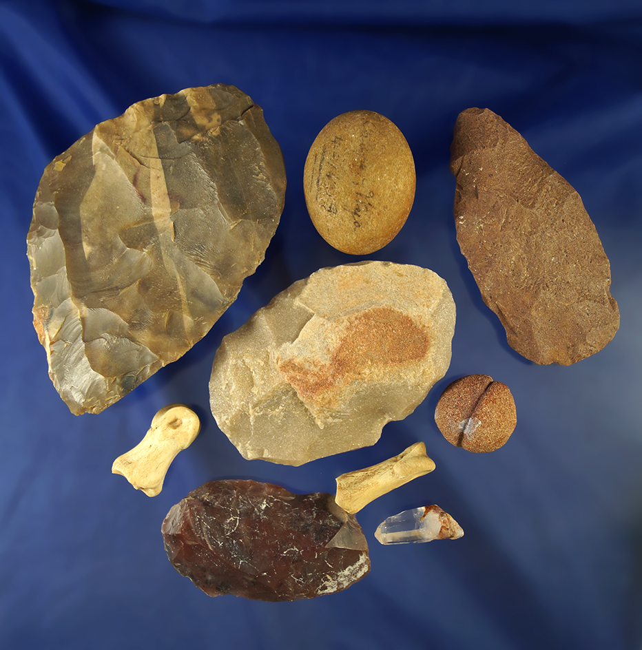 Set of assorted artifacts including blanks, Uniface knives and worked bone and stone. Wyoming.
