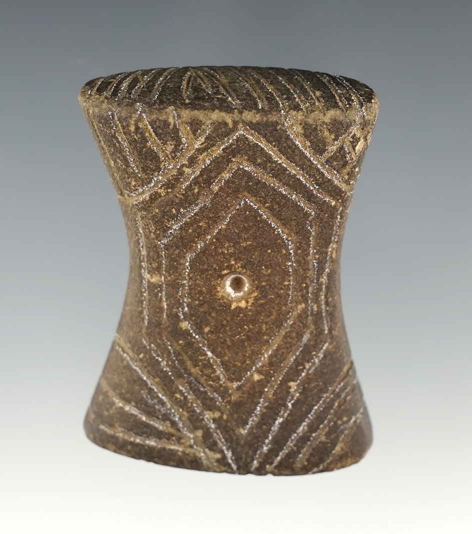 1 7/8" Highly engraved Stone Artifact that is well styled.