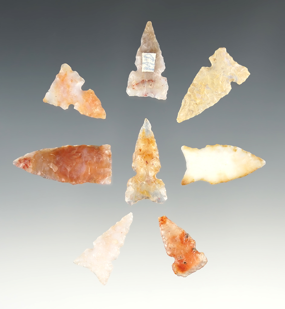 Set of 8 colorful New Mexico points in good condition. The largest is 1 1/4".