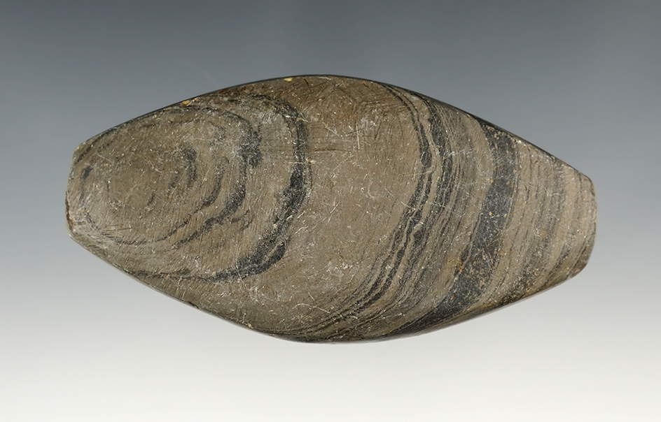 Nicely banded 3 7/16" Undrilled Expanded Center Gorget found in Ohio. Ex. Steve Olenick.