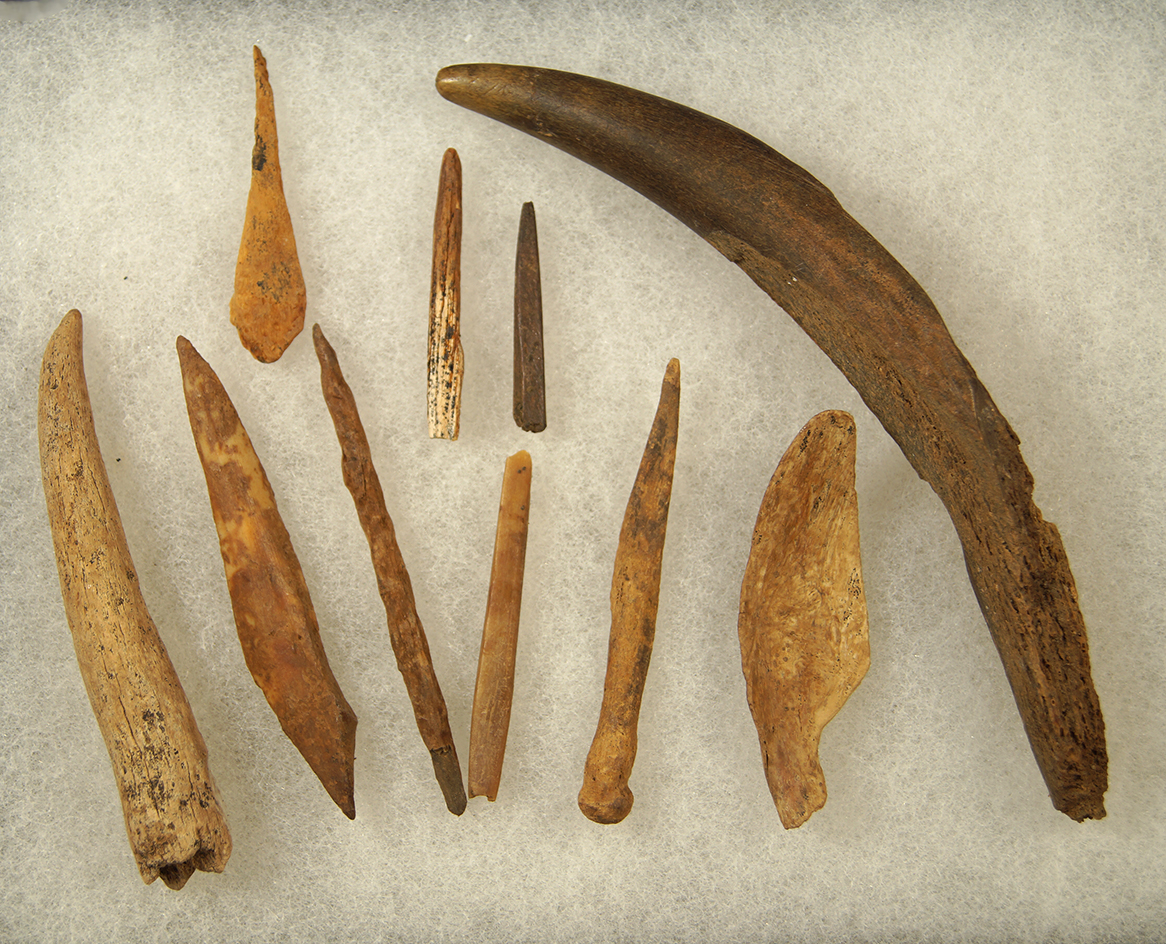 Group of 10 bone and antler relics, largest is 5 15/16". Found near the Columbia River.