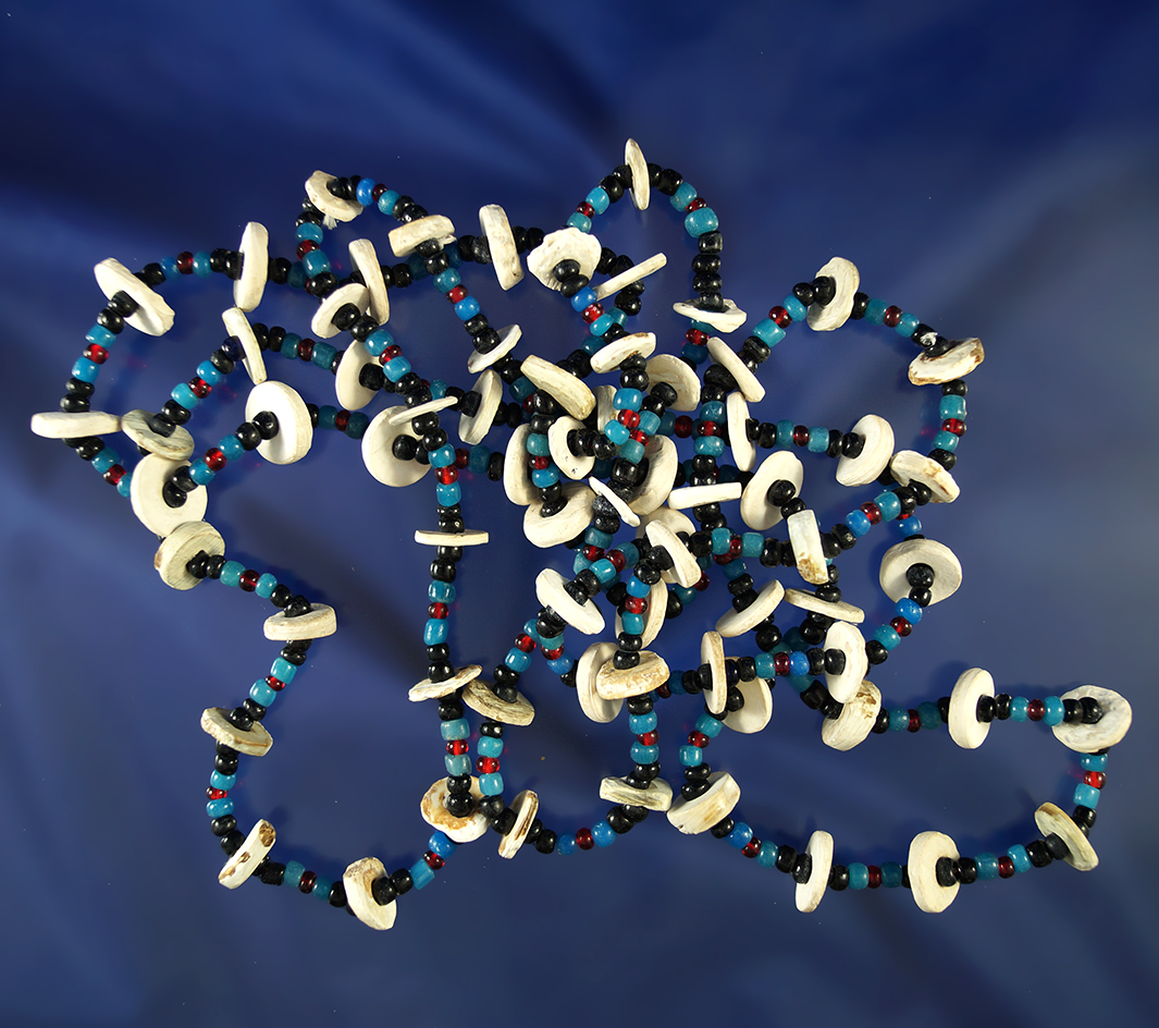 Large 48" strand of beautiful shell and glass trade beads. From the collection of Dewey Schmid.